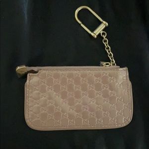 Gucci rose gold wristlet